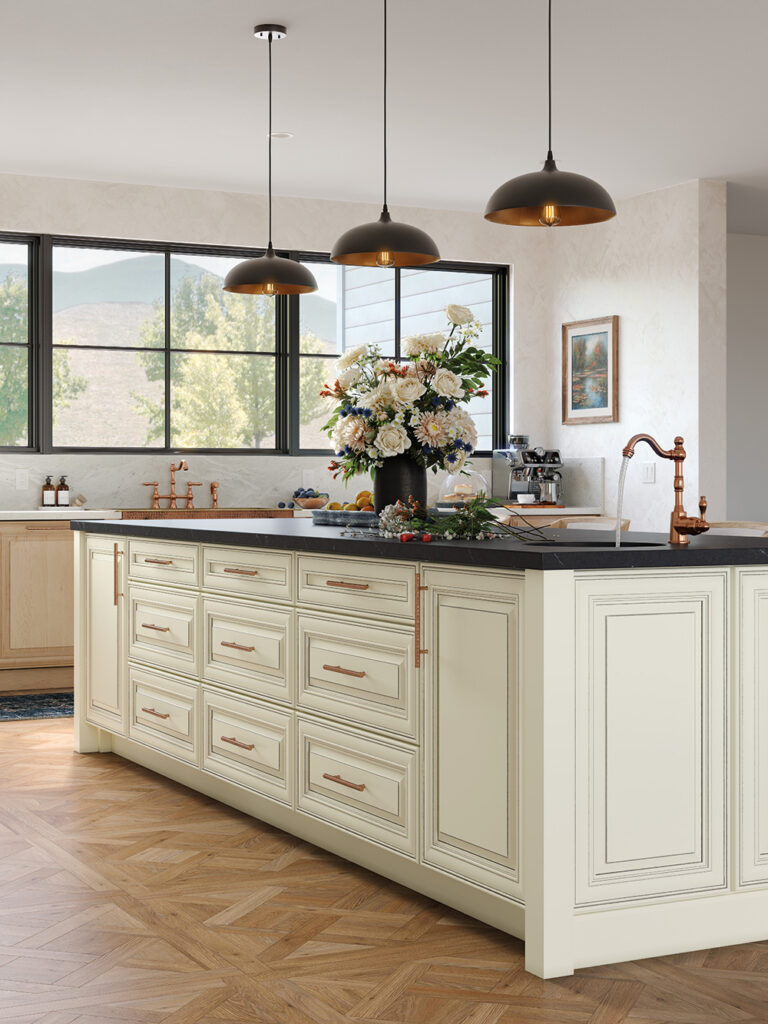 Cream kitchen island with copper hardware and a floral centerpiece, like kitchen cabinets near me.