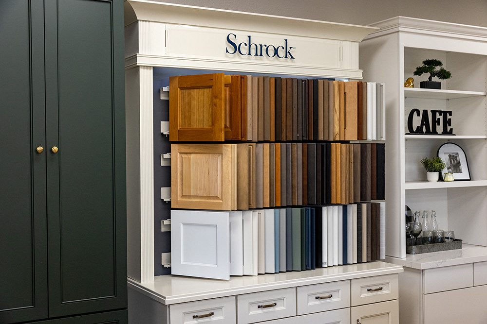Display rack showing a variety of wood and painted kitchen cabinet door samples.
