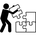 A person placing the final piece into a puzzle on the kitchen cabinets.