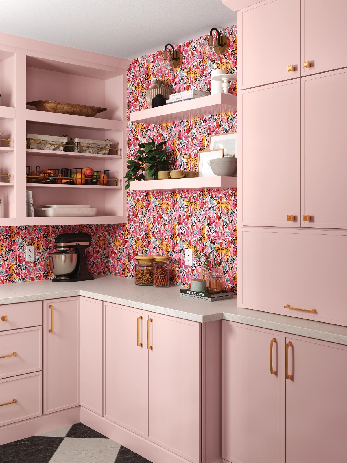 Pink kitchen cabinets with open shelving and vibrant leopard-print wallpaper.