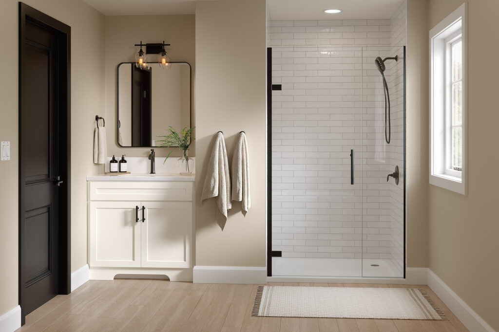 Bathroom with a vanity for cabinet inspiration, a mirror, and a glass-enclosed subway tile shower.